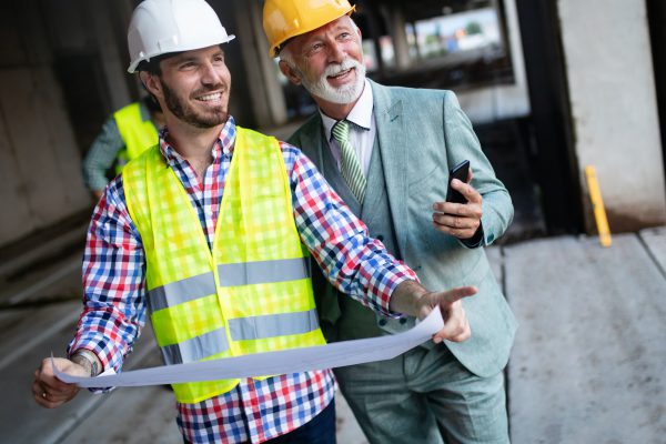 construction-engineers-discussion-with-architects-at-construction-or-building-site.jpg