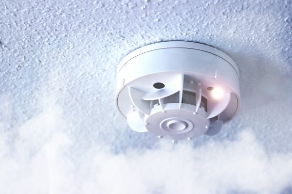 Smoke, fire detector. Fire protection, with smoke in the foreground.